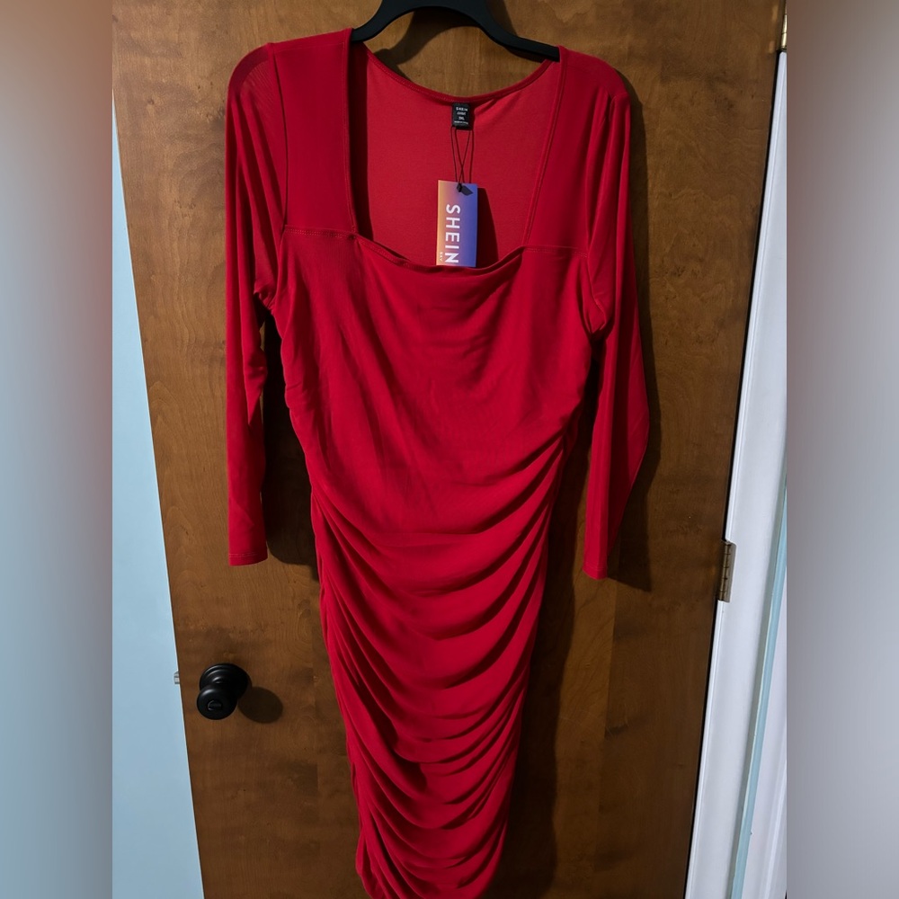 Mid length red body con dress. Brand new